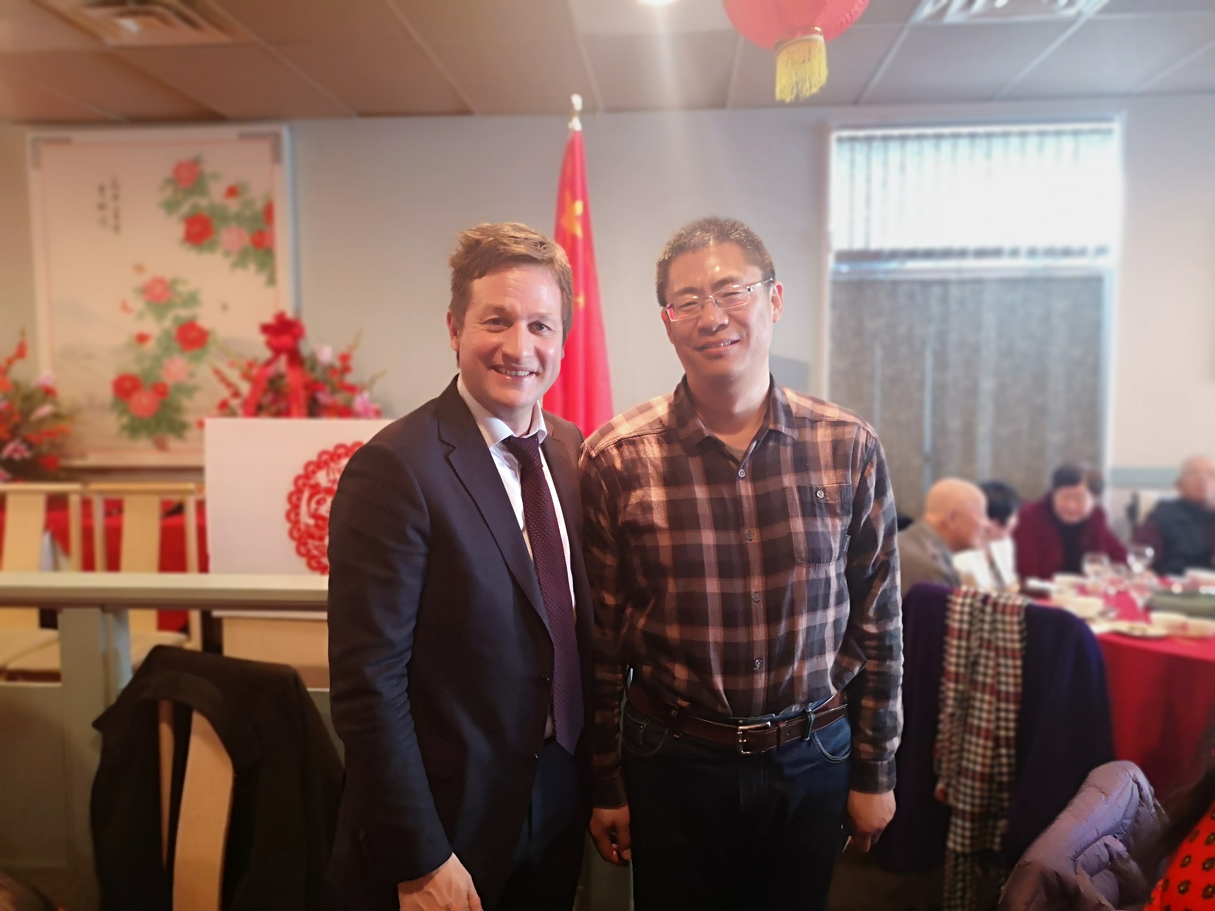Principal Li explores student aboard and education resources with Rob Fleming，BC Education Minister and MLA.